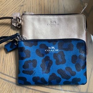 One Coach wristlet